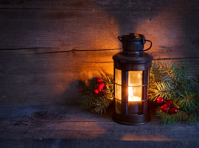 black candle lantern winter light tree spruce branch New Year 2k 4k