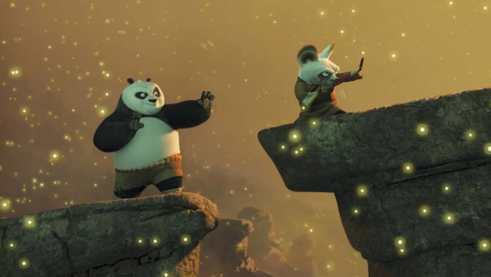 two black and white ceramic figurines Kung Fu Panda representation
