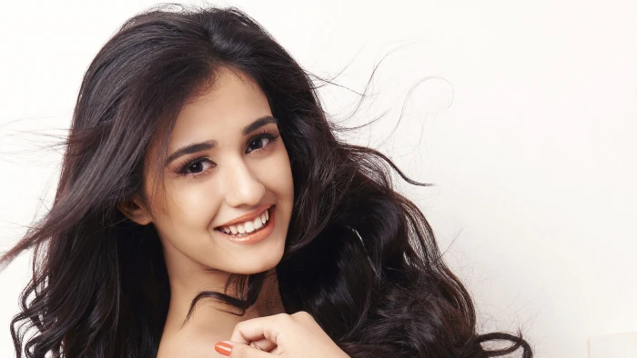 photo of a woman with brown lipstick on white background Disha Patani 2k