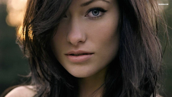 selective focus of woman face Olivia Wilde brunette portrait