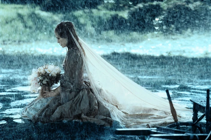 woman in wedding dress kneeling wallpaper Keira Knightley rain 2k