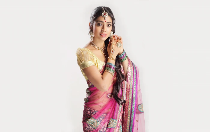woman wearing beige and pink ghagra cholli traditional dress 2k 4k 5k
