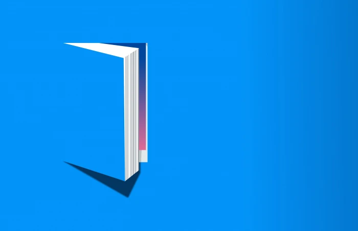 Open Book on Blue Background Knowledge and Reading Concept With Copyspace 2k