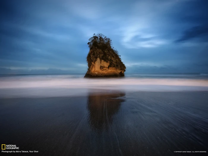 brown rock monolith landscape beach island National Geographic 2k