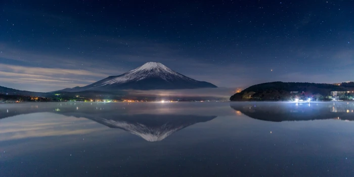 body of water nature photography landscape starry night volcano 2k