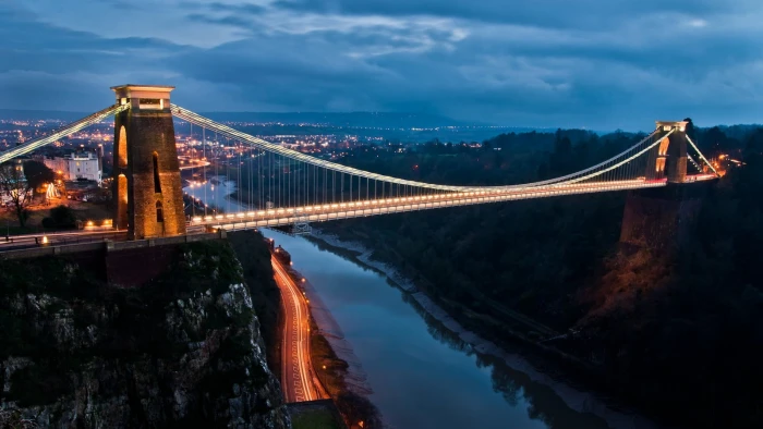 brown and gray bridge black concrete suspension at night 2k