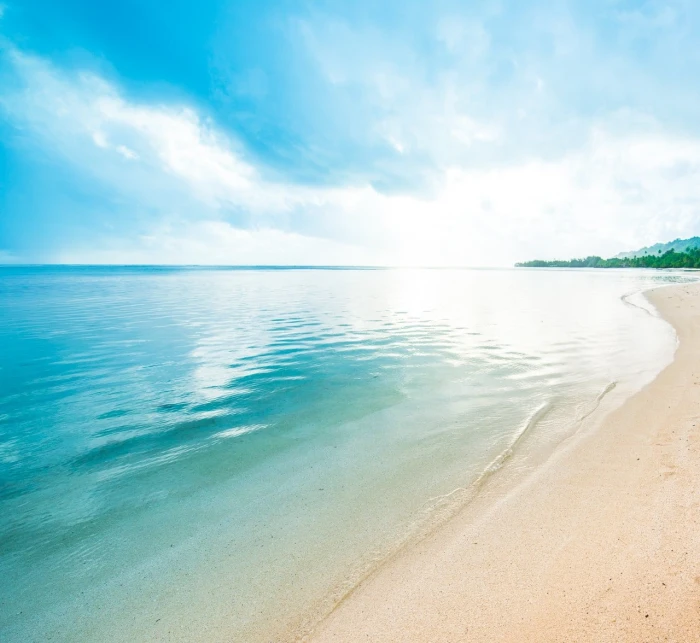 seashore beach sand clouds Caribbean water peaceful nature