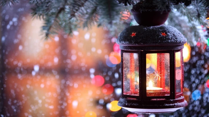 black lantern with tealight candle nature winter snow trees 2k