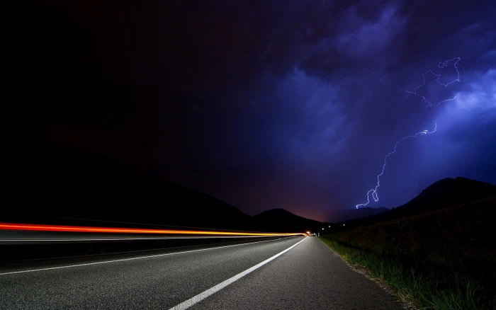 time lapse photography of cars on asphalt road landscape nature 2k