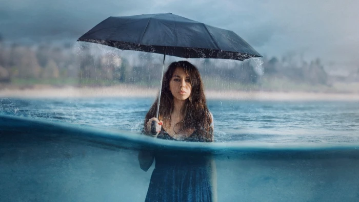 women umbrella rain sea foam beach island water Photoshop 2k