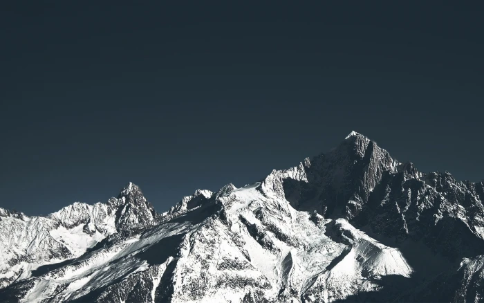 snow covered mountain mountains rocks clear sky nature cold temperature 2k