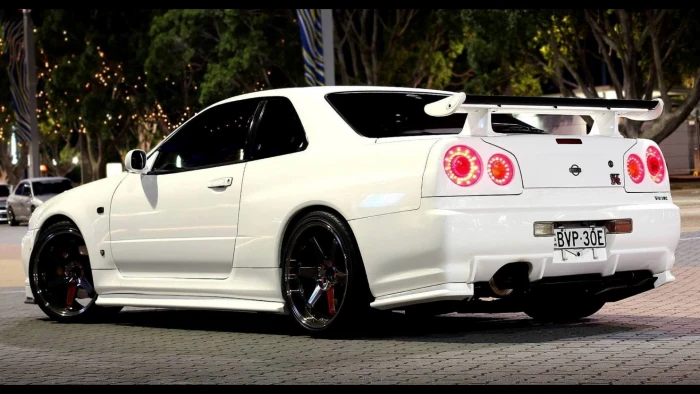 white Nissan Skyline GT R V Spec II JDM 2k