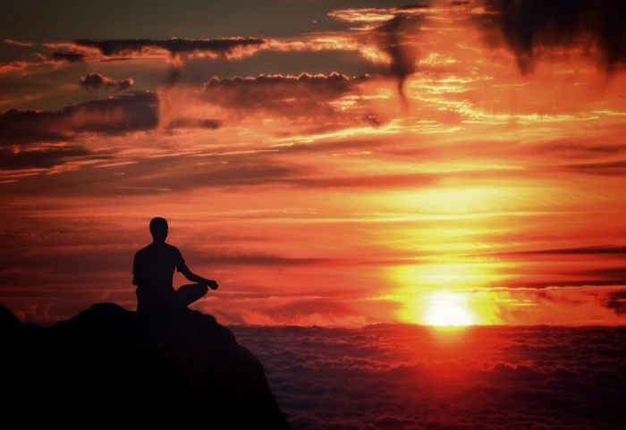 Meditation Mindfulness Person Meditating at Sunset Over the Clouds 2k