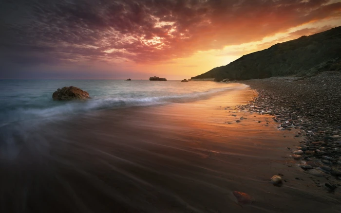 seashore at golden hour Cyprus nature water sunset clouds 2k