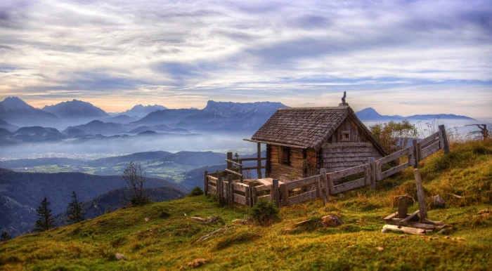brown wooden table with chairs nature landscape mist mountains 2k
