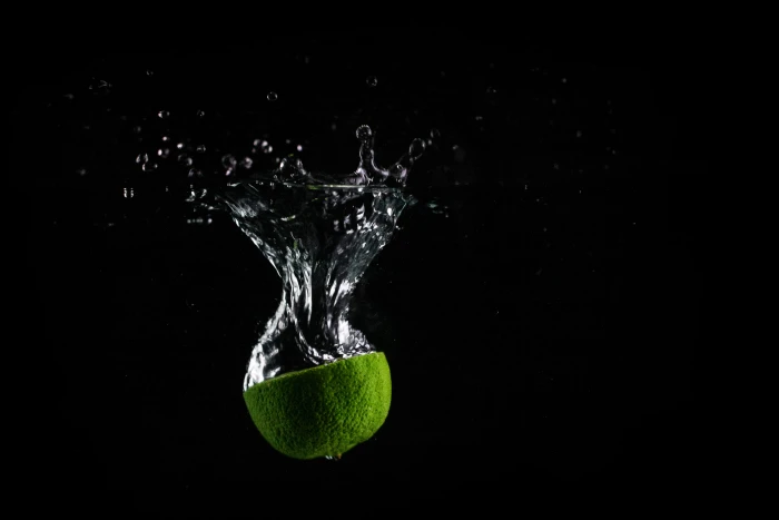 Lime In Water with Black Background fresh fruit healthy splashing 2k 4k