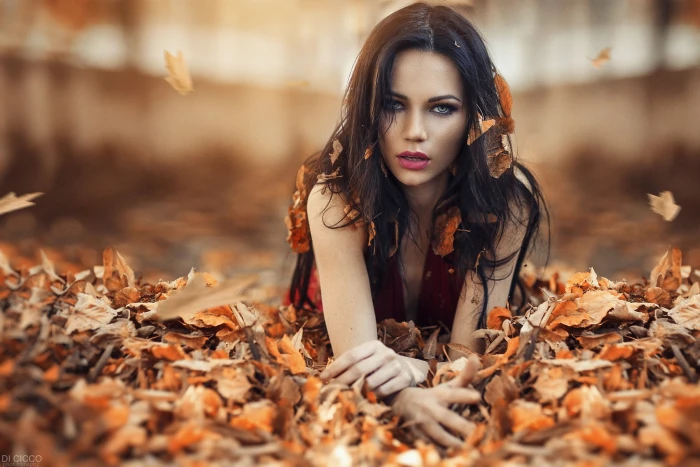 women's red dress close up photo of woman in plunging neckline top on brown leaf flowers 2k