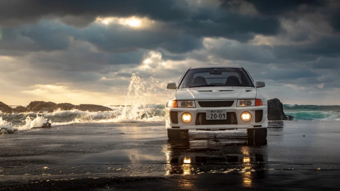 beach waves Mitsubishi Lancer Evo V Headlights frontal view 2k