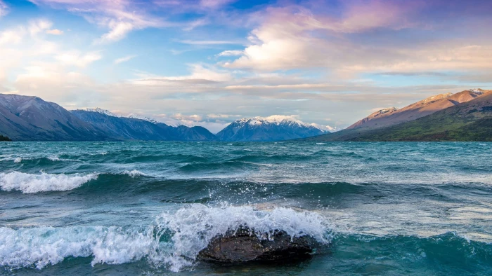 rock mountain and body of water photo nature lake New Zealand 2k