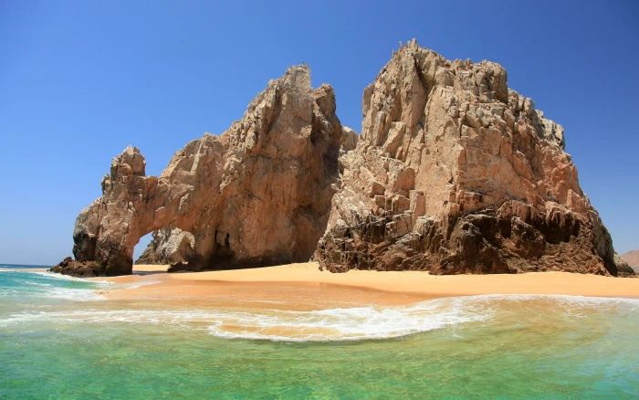 rock formation island beach arch day sea coastline nature 2k