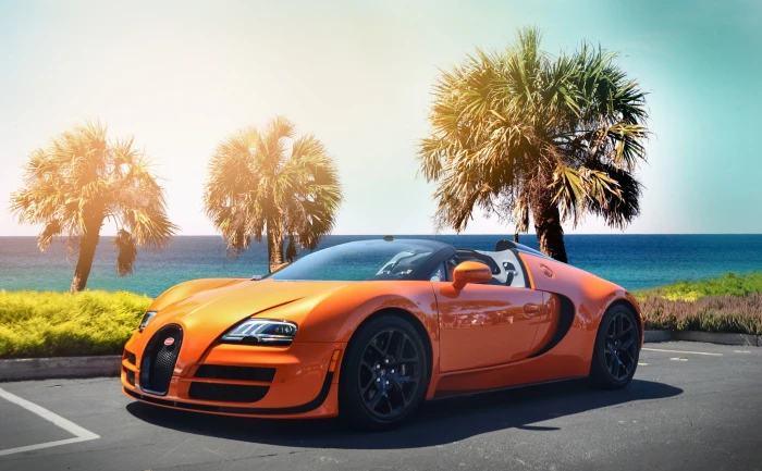orange Bugatti Veyron beach palm trees hypercar sports Car 2k
