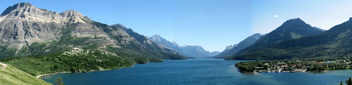 Mountains shoreline and lake landscape in Waterton lakes national park panorama 2k 4k