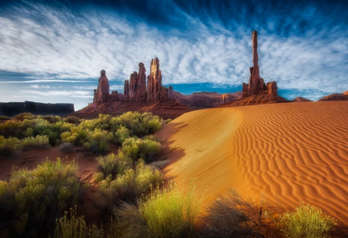 brown sand desert dune Arizona shrubs rock clouds erosion 2k