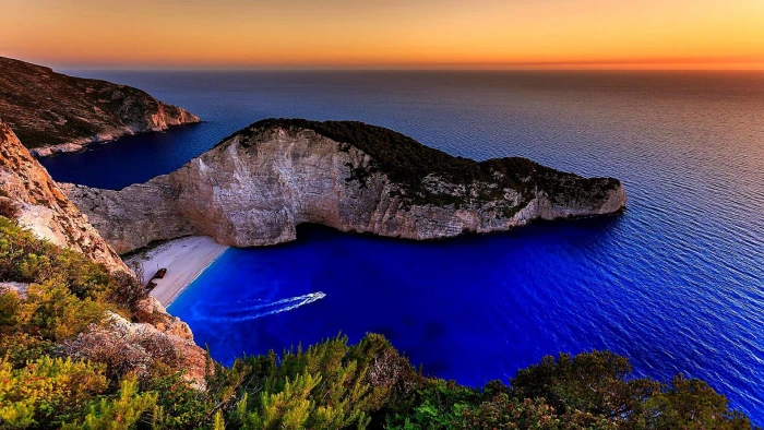 sea beach sun blue water seashore bay sunset navagio 2k