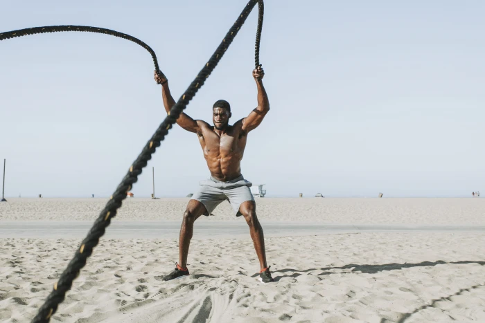 Man Holding Rope on Both Hands athlete beach biceps body 2k 4k