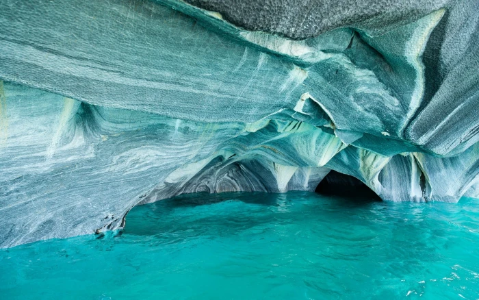 blue and white rock cave landscape nature Chile lake erosion 2k