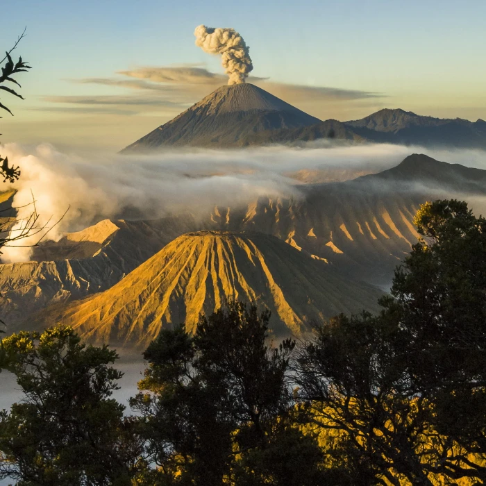 photography of gray volcano with blue sky as background mount bromo java indonesia 2k