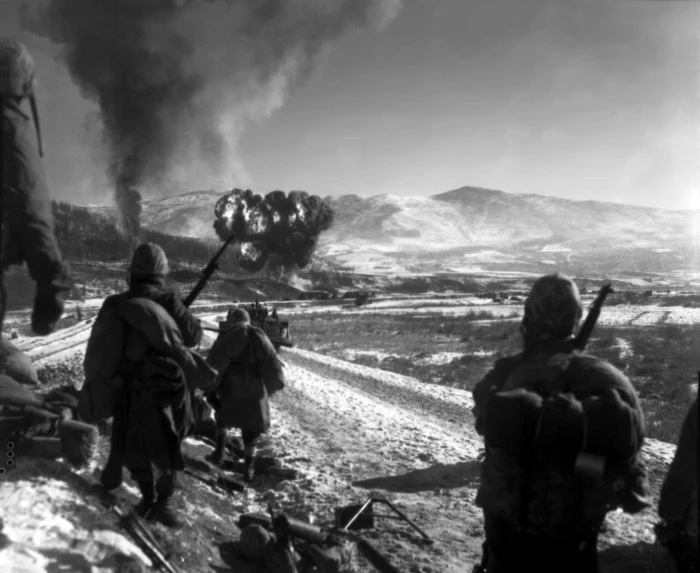 Marines watching explosions to flush out enemies Korean War 2k