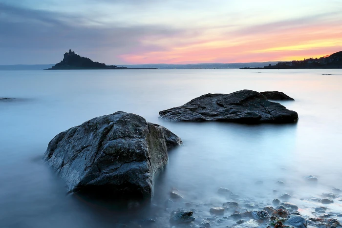 two brown rock fragment on bodies of water Evening Stillness 2k 4k