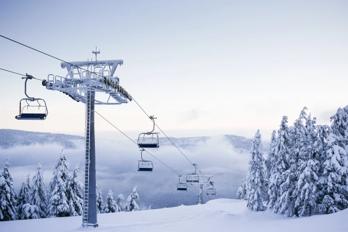 Empty Chair Ski Lift on Bright Winter Day cold fog foggy forest 2k 4k