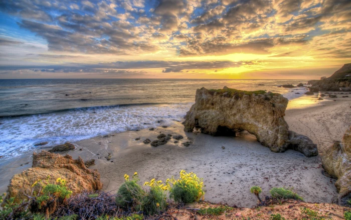 photo of seashore under nimbus clouds beach sky water beauty in nature 2k