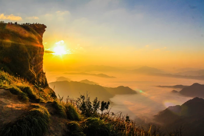 Aerial Photo of Mountain Surrounded by Fog adventure asia background 2k 4k
