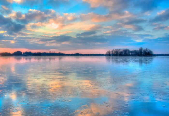 aerial photography of river under blue and white sky frozen 2k 4k