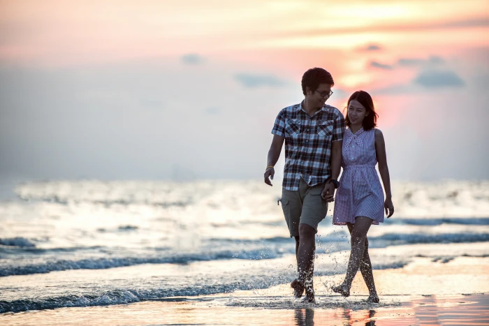 couple man and woman walking in seashore romance pair sunset 2k 4k 5k