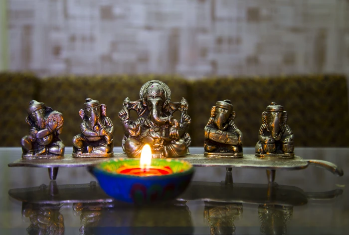 selective focus photography of Ganesha figurine puja deepavali 2k 4k 5k