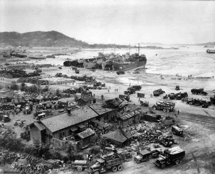 Tank landing Ships unload men at Inchon during the Korean War 2k