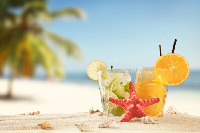 two clear glass cups sand sea beach summer the sun stay 2k 4k 5k