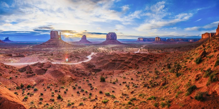 brown sand under cloudy sky during daytime monument valley utah 2k 4k