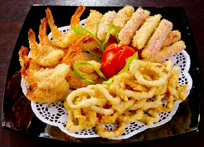 tempura green vegetable and calamari on brown table food korean cuisine 2k 4k
