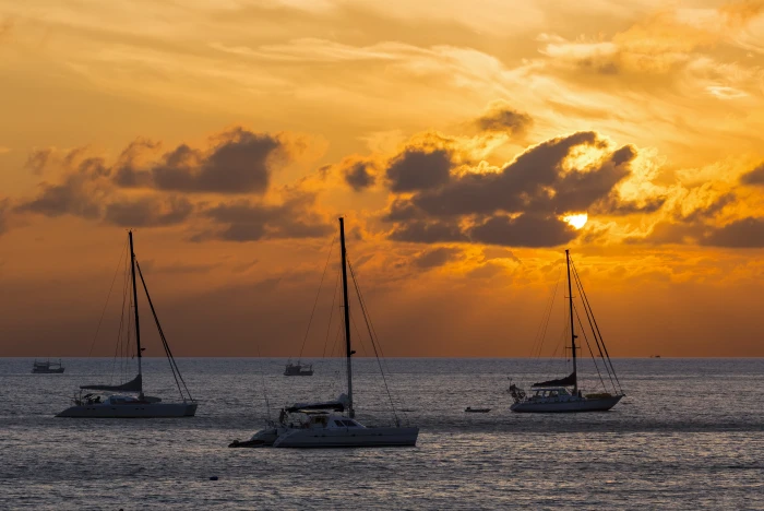 three yacht on large body of water under cloudy sky during sunset thailand 2k 4k 5k