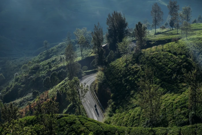 aerial view of road surrounded with mountains scenery nature 2k 4k 5k