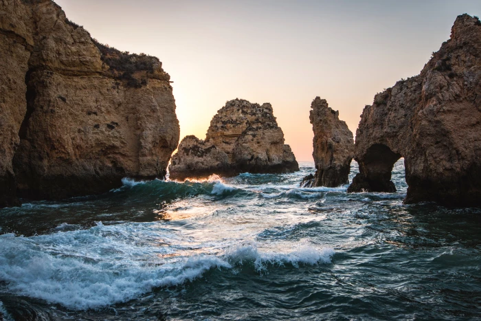 body of water Portugal lagos sunrise Europe rocks cliff 2k 4k 5k