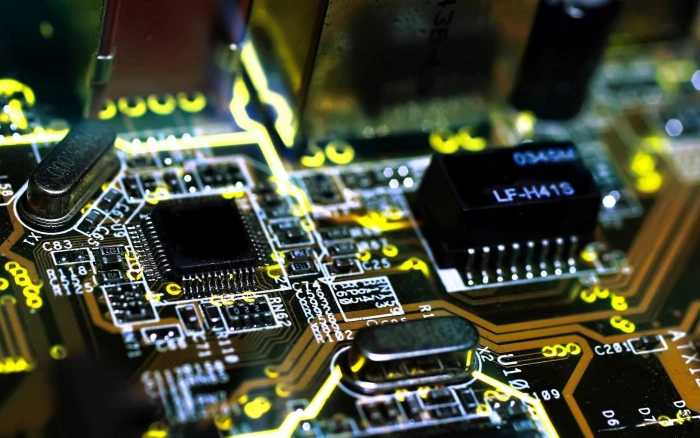 black circuit board shallow focus of and green 2k