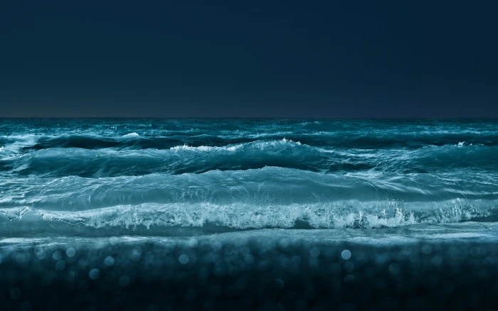 ocean waves photography of body water during night time beach 2k