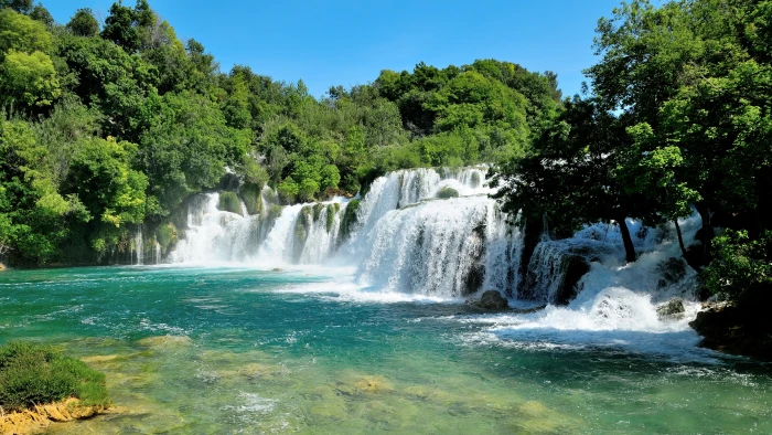 body of water across forest during daytime krka waterfall croatia 2k 4k