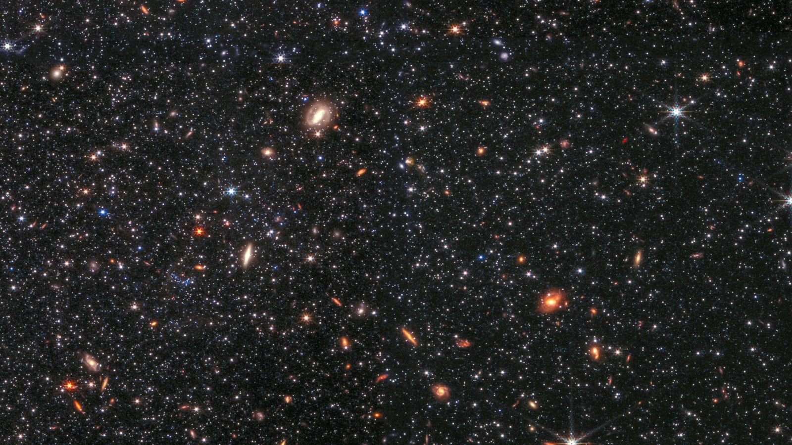 Webb telescope Dwarf galaxy WLM NIRCam Top and bottom 2k